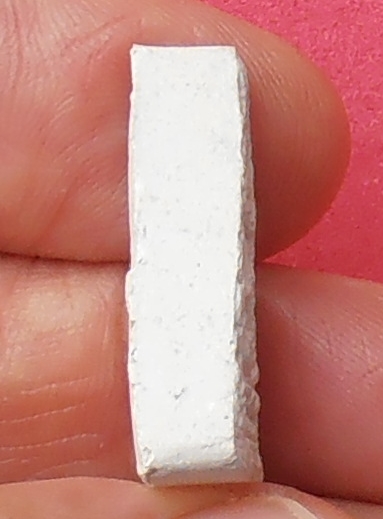 พระผงวัดปากน้ำ รุ่น ๔ พิมพ์สามเหลี่ยม