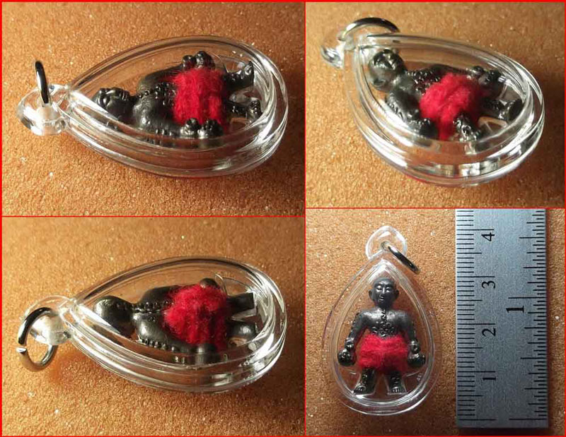 หุ่นพยนต์มหาโชคลาภ หลวงพ่อแสง วัดส้มป่อย จ.บุรีรัมย์ เนื้อสัมฤทธิ์ อุดผงพุทธคุณ ปี 2551 เลี่ยม