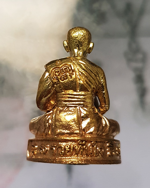 รูปหล่อรุ่น รวยทันใจ ๙๙ หลวงพ่อพัฒน์ วัดห้วยด้วน จ.นครสวรรค์ เนื้อทองทิพย์ก้นชนวน หมายเลข 1803