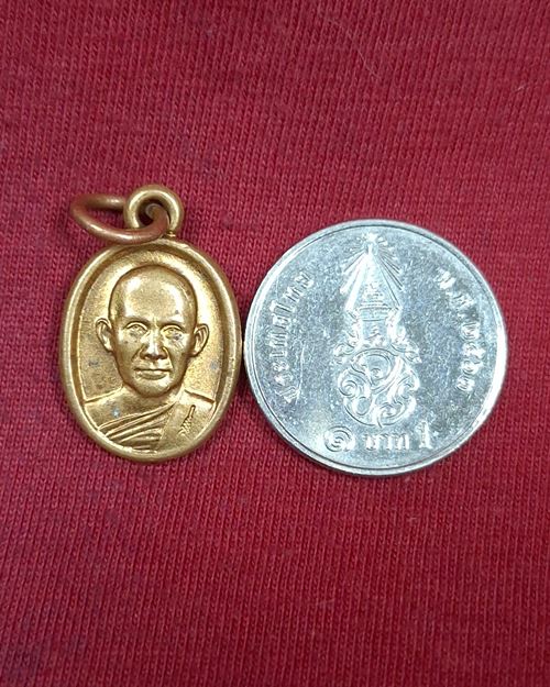 เหรียญเม็ดแตง ครูบาน้อย ตอกโค๊ต วัดศรีดอนมูล จ.เชียงใหม่ ปี2553