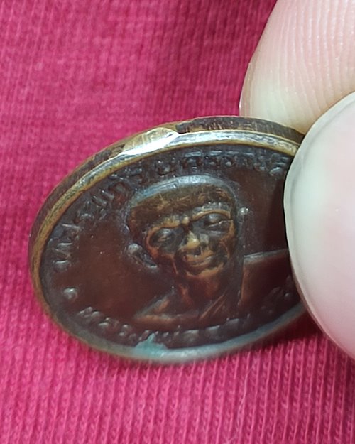 เหรียญกลมเล็ก หลวงพ่อคูณ ปริสุทโธ วัดบ้านไร่ ออกวัดสระแก้ว จ.นครราชสีมา หูตัดเก่า ปี20