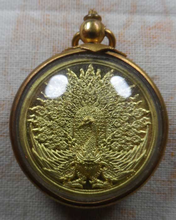 เหรียญพญานกยูง รุ่น รวย เน้น เน้น พระครูบาชัยยาปัถพี สถานธรรมดอยดวงแก้วสัพพัญญู จ.เชียงราย