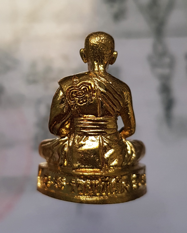 รูปหล่อรุ่น รวยทันใจ ๙๙ หลวงพ่อพัฒน์ วัดห้วยด้วน จ.นครสวรรค์ เนื้อทองทิพย์ก้นชนวน หมายเลข 1828