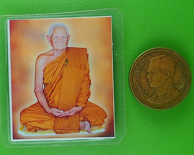 รูปภาพพระเกจิ หลังปั๊มยันต์ .B738.