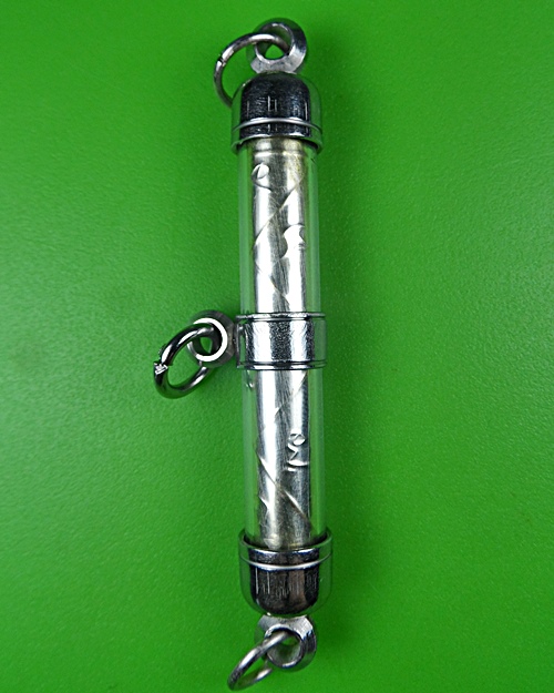 ตะกรุดตรีนิสิงเห หลวงปู่สิงห์ วัดบ้านขี้เหล็ก ศรีสะเกษ .B828.