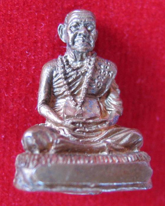 รูปเหมือนกริ่งลอยองค์ เนื้อนวะ หลวงปู่พรหมมา วัดสวนหินผานางคอย อุดกริ่ง ตอกโค๊ตใต้ฐาน..เคาะเดียวแดง.