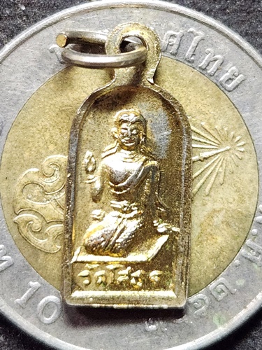 วัดโสธรวรารามวรวิหาร จังหวัดฉะเชิงเทรา เหรียญปรกใบมะขามหลวงพ่อโสธร หลังนางกวัก ปี พ.ศ. 2518