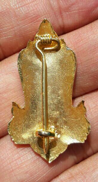 เหรียญเข็มกลัดลงยา พระธาตุศรีสองรัก เคาะเดียว