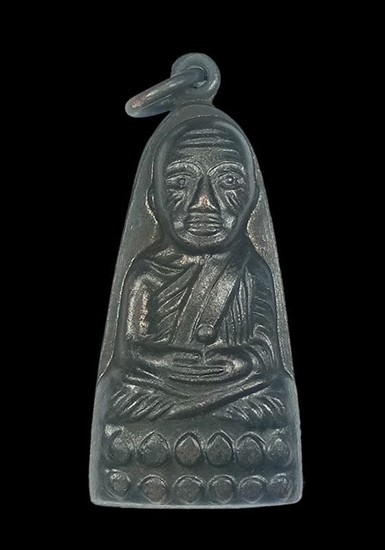 พระหลวงปู่ทวดพิมพ์เตารีด(มีหู) หลังตัวหนังสือพิมพ์ใหญ่(แจกปีนัง/มาเลเซีย) เนื้อทองแดง ปี2524