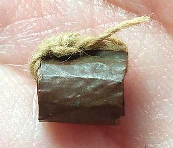 *ตะกรุดม้วนลูกอมโลกธาตุ หลวงพ่อเปลี่ยน วัดใต้ กาญจนบุรี*