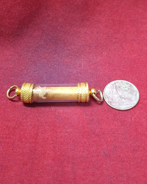 ตะกรุดไม้หวาย ในงานฝังลูกนิมิต เลี่ยมเดิมจากวัด