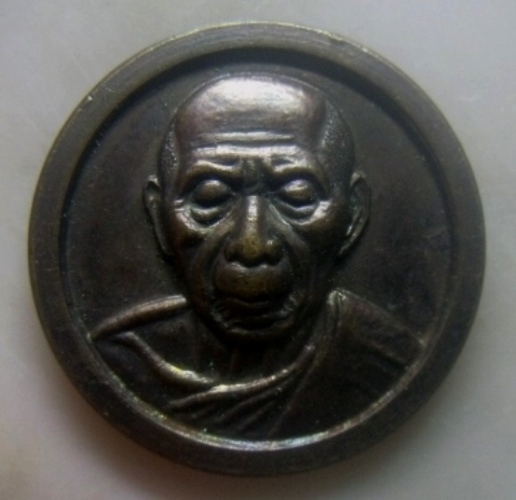 **เบาๆ**เหรียญกลมหลวงปู่ทิม รุ่นมูลนิธิหลวงปู่ทิม ๒๒ ปี วัดละหารไร่ หลังพระพิฆเนศ ปี ๒๕๔๐**สวยๆ