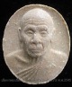 พระเม็ดกระดุมเนื้อผงหลวงปู่แผ้ว ปวโร ปี 2545 องค์ที่ 5