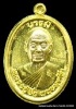 เหรียญครึ่งองค์หลวงปู่จื่อ พฺนธมุตโต รุ่นมงคลบารมี ๖ รอบ ๗๒ ปี เนื้อเทองคำ ไม่ตัดปีกหลังยันต์ ปี ๒๕๕