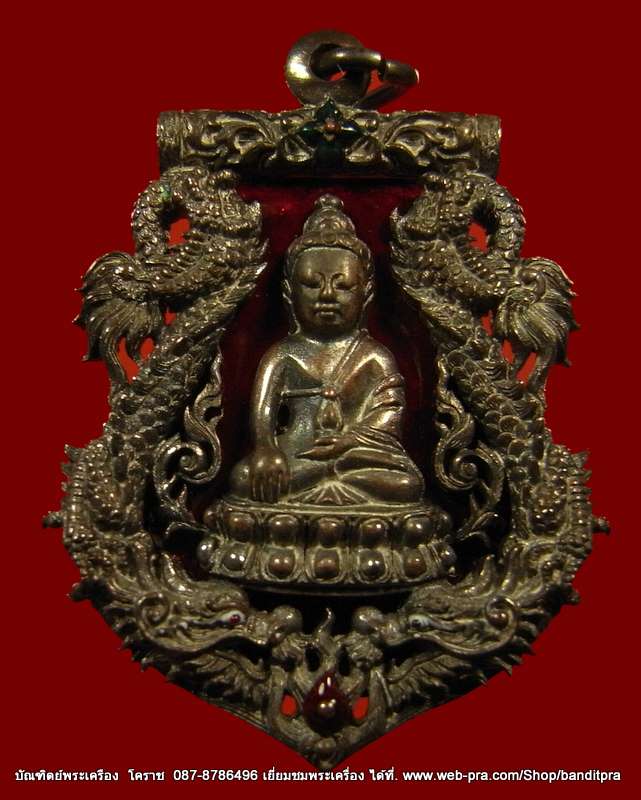 เหรียญเสมาฉลุ  พระกริ่งปวเรศ เนื้อนวะลงยาแดง เลข ๔๐๒ รุ่นพุทธปวเรศ วัดบวรนิเวศวิหาร - 1