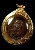 เหรียญโภคทรัพย์ หลวงปู่สี เนื้อทองแดงเลี่ยมจับขอบทอง ปี 2519 วัดเขาถ้ำบุญนาค จ.นครสวรรค์