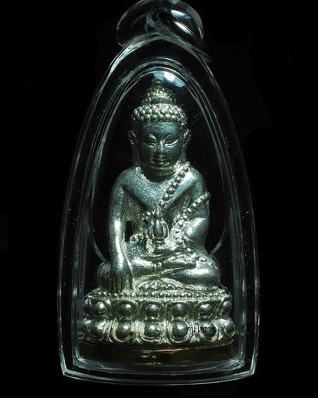 พระกริ่งพยัคฆ์ทักษิณ (ก้นเสือ รุ่นแรก ) เงินก้นทอง หมายเลข ๖ จำนวนการสร้าง ๙ องค์ - 1