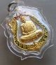3.หลวงปู่จื่อ พนฺธมุตฺโต เหรียญเสมา รุ่น ชินบัญชร เนื้อเงินหน้ากากทองคำ ขอบทองคำ บนแดง-ขอบเขียว เลข4