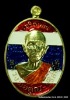 เหรียญหลวงพ่อคูณ รุ่นเจริญพรบน -ล่าง ๒ หน้า วัดแจ้งนอก ปี ๒๕๕๗ เนื้อทองฝาบาร ลงยาสีธงชาติ
