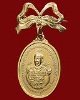 เหรียญกรมหลวงชุมพร รุ่นสร้างศาลปากน้ำตะโก 2519 จ.ชุมพร เนื้อทองแดงกะไหล่ทอง พร้อมโบว์