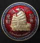 เหรียญเศรษฐีเรือทอง เนื้อกะไหล่ทองลงยาสีแดง