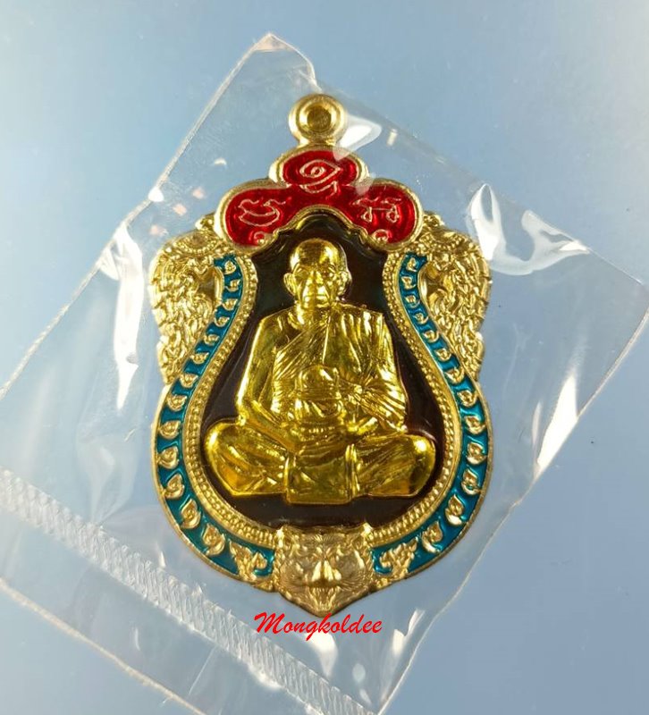 เหรียญเสมาหัวเสือ รุ่นแรก หลวงพ่อรัตน์ วัดป่าหวาย เนื้อมันปูขอบอาบเงินองค์ฝาบาตร ลงยาสีฟ้า No.954 - 1