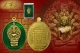 เหรียญนาคปรกเนื้อทองทิพย์ลงยาสีเขียว รุ่น มงคลมหาลาภ หลวงปู่บัว ถามโก พศ.2559 หมายเลข 985