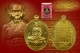 เหรียญนั่งโต๊ะเนื้อทองทิพย์ รุ่น มงคลมหาลาภ หลวงปู่บัว ถามโก พศ.2559 หมายเลข 3082