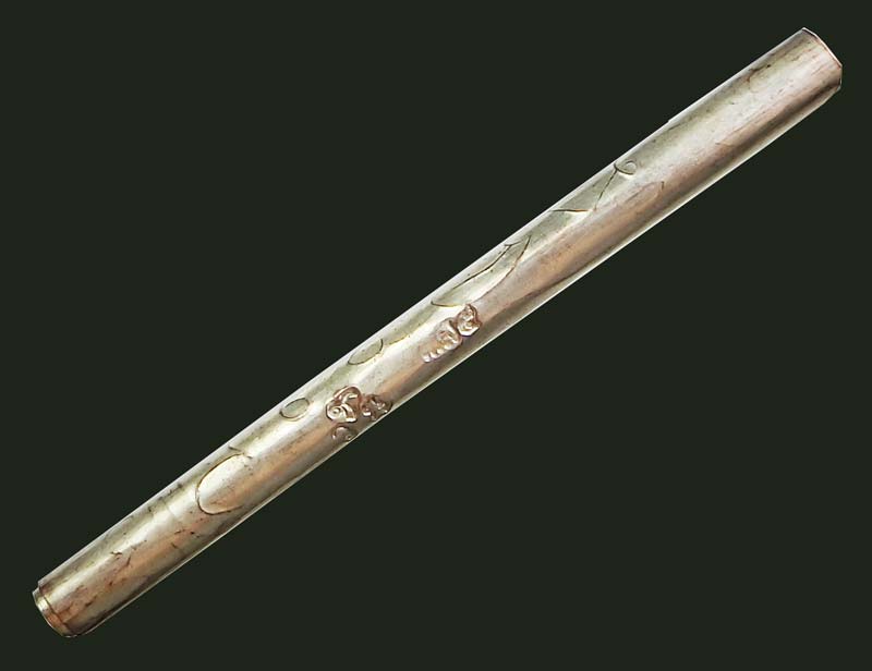 ตะกรุดจารมือยันต์นะหน้าทอง เนื้อเงินผสม หลวงพ่อตัด วัดชายนา ปี 2549 ตอก 2 โค๊ดนิยม - 2