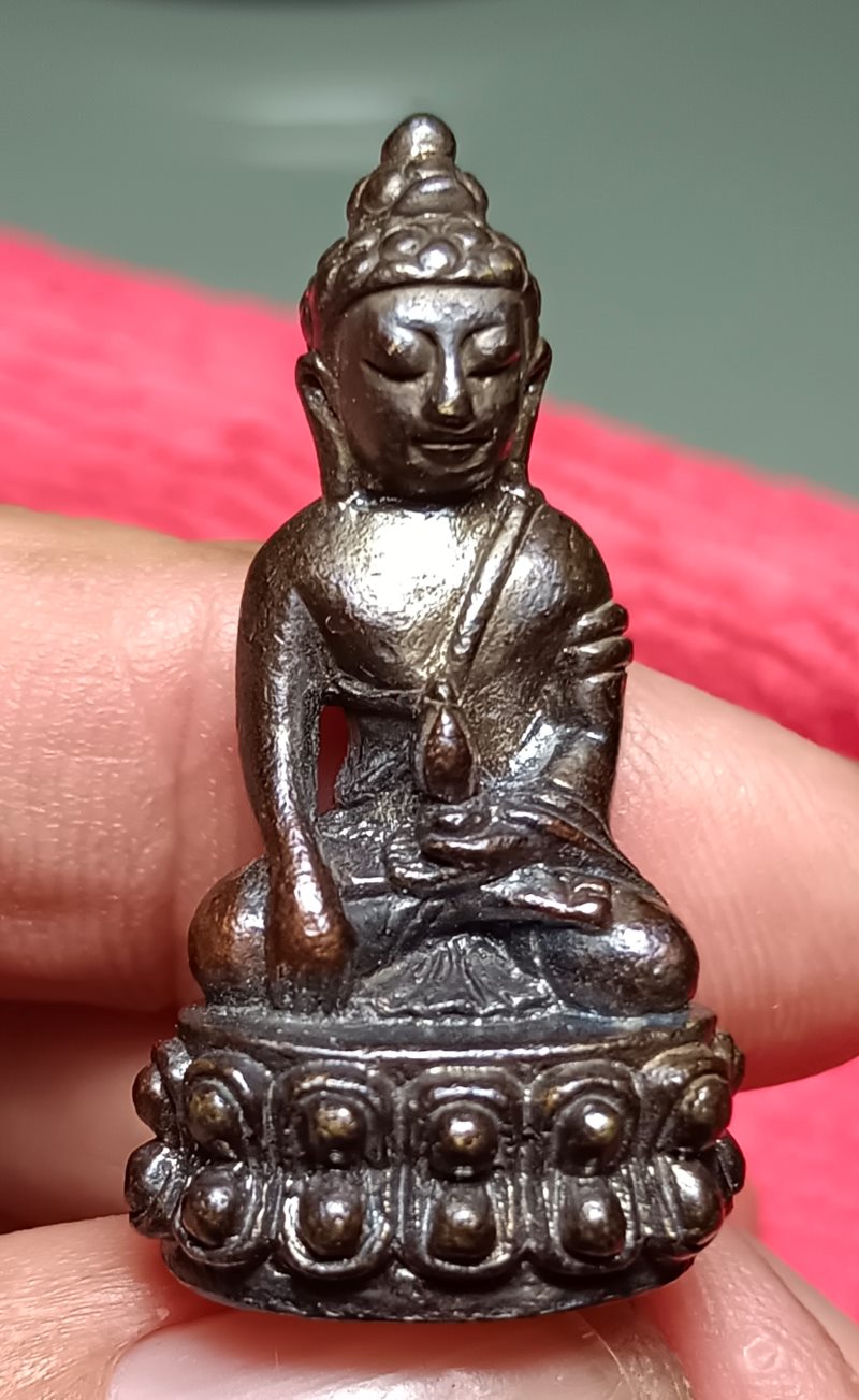 พระกริ่งเศรษฐีเงินล้านหลวงปู่หมุน โค๊ดเลเซอร์ ปี2543 - 1