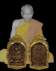 เหรียญหล่อนั่งพาน รุ่นปลดหนี้  หลวงปู่นิล อิสริโก   จ.นครราชสีมา เนื้อทองผสม ปี 2537 เลี่ยมสวย พร้อม
