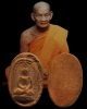 พระเนื้อดิน พิมพ์เม็ดบัว หลวงพ่อขอม วัดไผ่โรงวัว ปี 2505 จ.สุพรรณบุรี  ครั้งหนึ่งพระพิมพ์นี้เคยเป็นท