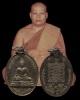 เหรียญรูปไข่เนื้อทองแดงกะหลั่ยเงิน  พระพุทธชัยมงคลมารวิชัย หลังเต่าเรือน  หลวงพ่อสนิท วัดลำบัวลอย จ.