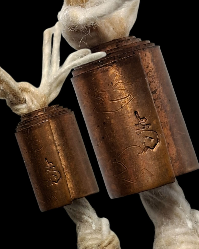 ตะกรุดลูกอม โลกธาตุ เนื้อทองแดง - 1