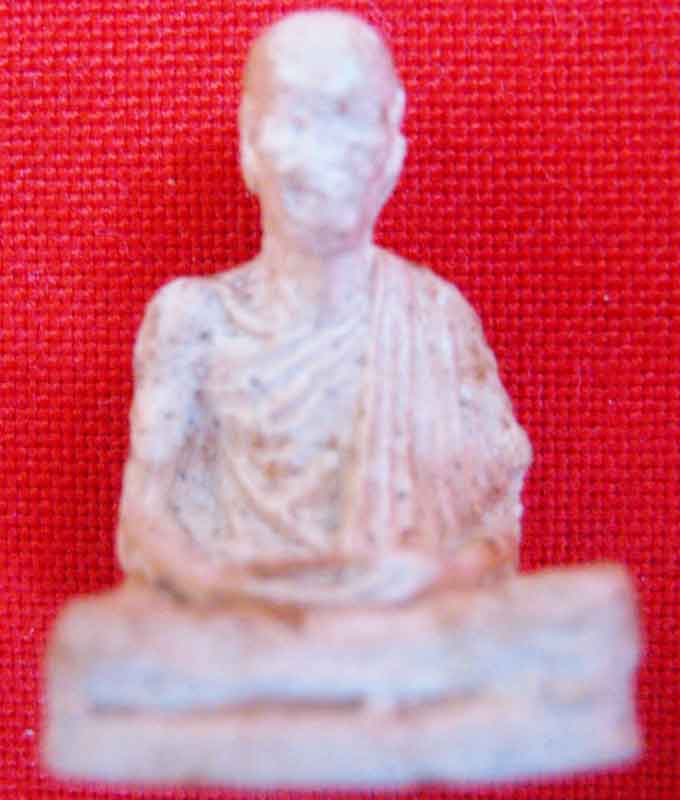 รูปเหมือนเนื้อผง หลวงพ่อเกษม ก้นหนู แท้ใหมครับ ถ้าแท้สร้างปีใหนครับ ราคาเท่าใหร่ครับ