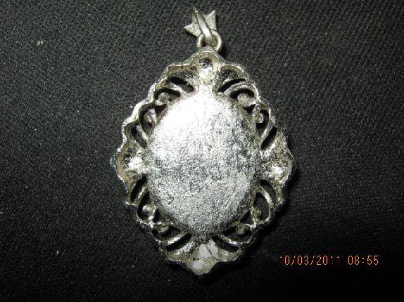 เหรียญล็อกเก็ตหลวงพ่อมุ่ย