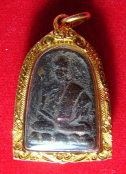 ครูบาผาผ่าเนื้อผงยันต์หางยาว