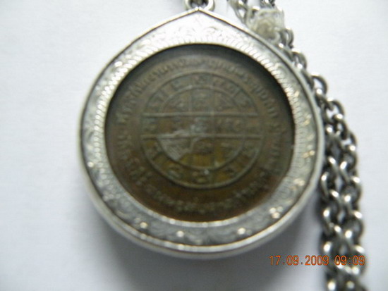 มีเหรียญหลวงพ่อมุ่ยมาให้ดูด้วยครับ