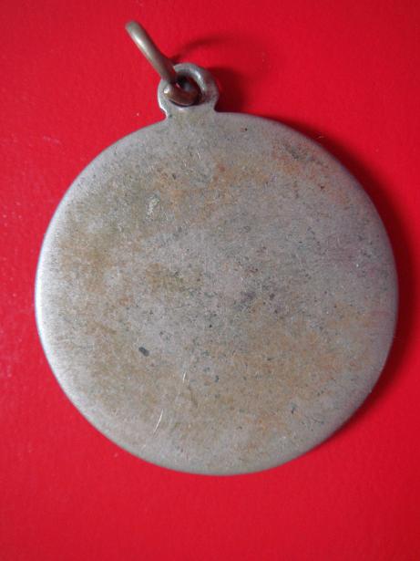 เหรียญกลม หลวงพ่อบุญมา - หลวงพ่อมุม แท้ไหมครับ รบกวนครับ