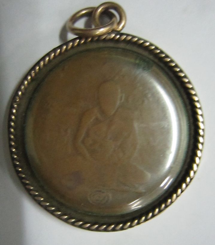 	เหรียญหลวงพ่อกลั่นนักกล้าม 2477