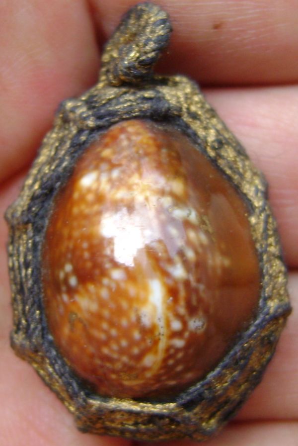 เบี้ยแก้ มัดตระกรุด