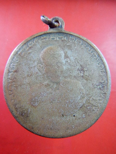 เหรียญกลมหลวงชุมพร ร.ศ129 หลังหลวงปู่ศุข แท้มั๊ยคับ