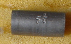 [Auto] achariya - ตะกรุด จิ๋ว เนื้อตะกั่ว มีโค้ต ไม่ทราบที่ครับ 