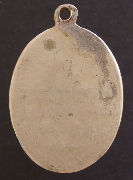 รบกวนพี่ๆครับ เหรียญหลวงปู่ขาว ปี09