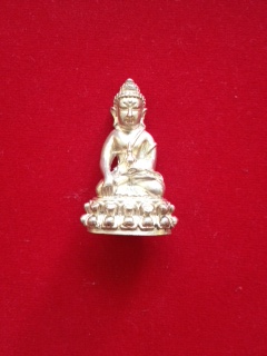 พระกริ่งกัลยา ณ ธัมโม เนื้อเงิน ก้นเงิน หลวงปู่แตงอ่อน หมายเลข64