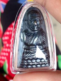 ปู่ทวดพิมพ์เตารีด หลังหนังสือ