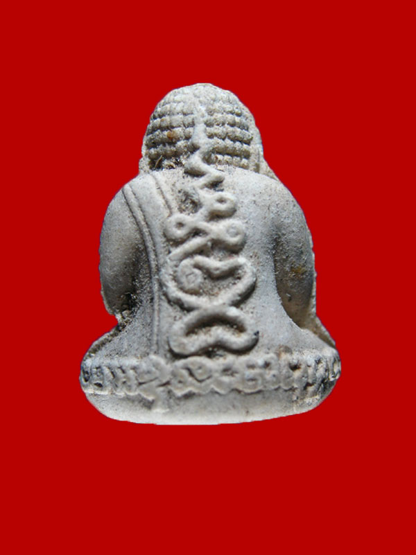 หลวงปู่หมุน วัดบ้านจาน รุ่นไตรมาส รวยทันใจ ปี 43 เนื้อผงงาช้าง ตอก 2 โค้ต